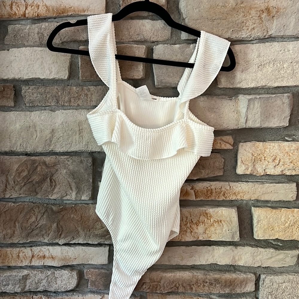 Caution to the Wing Tank